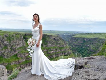 Mane in Miss Stella York wedding dress